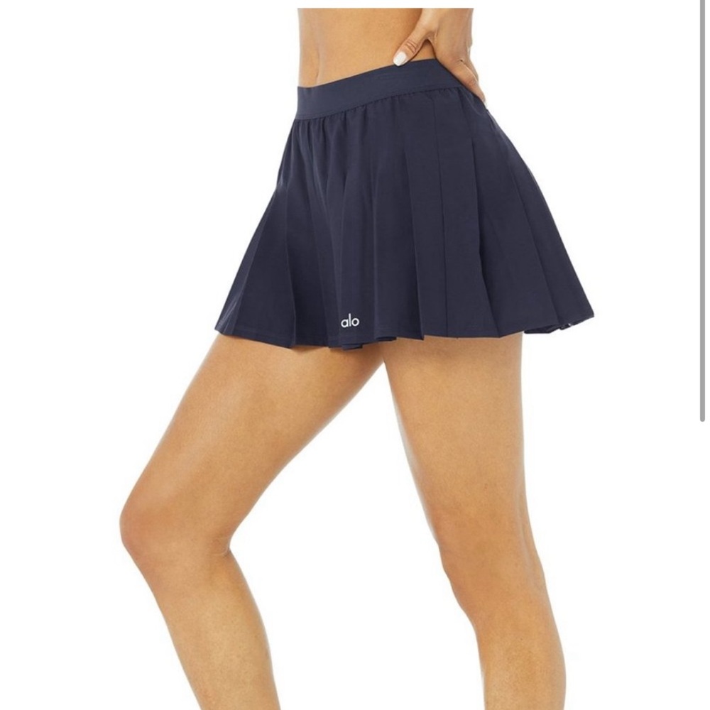 ALO Varsity Pleated Tennis Skirt, size 6 in a classic navy blue. Only worn once